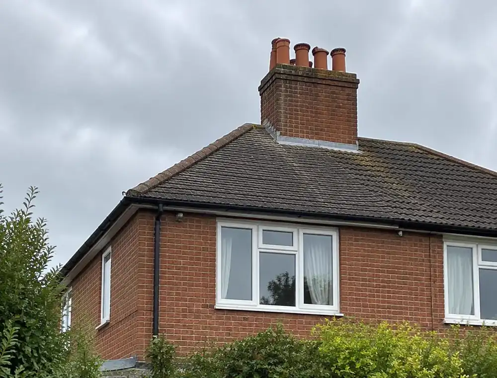 Brick chimney stack on a suburban semi